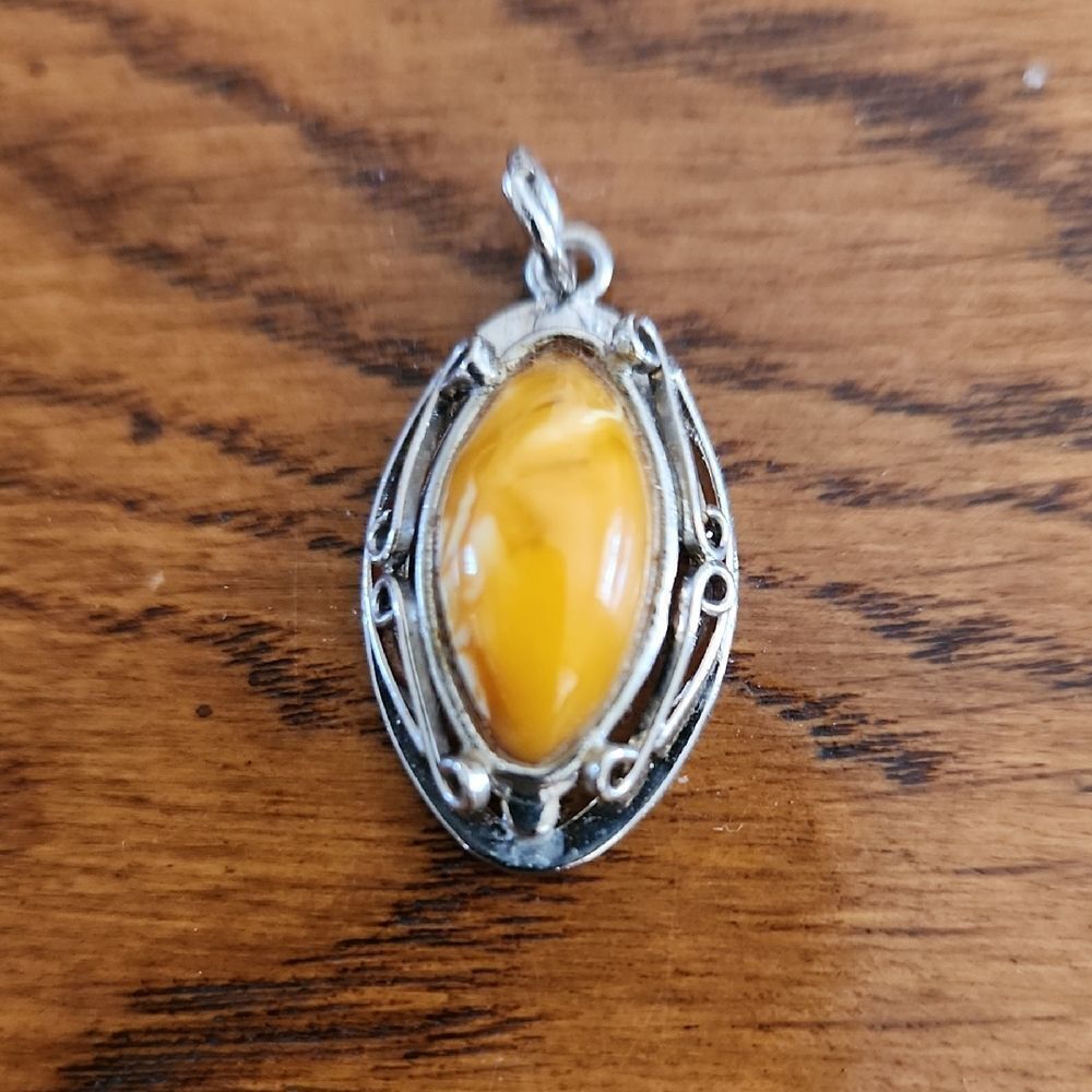 Artisan Silver Necklace with Yellow Gemstone